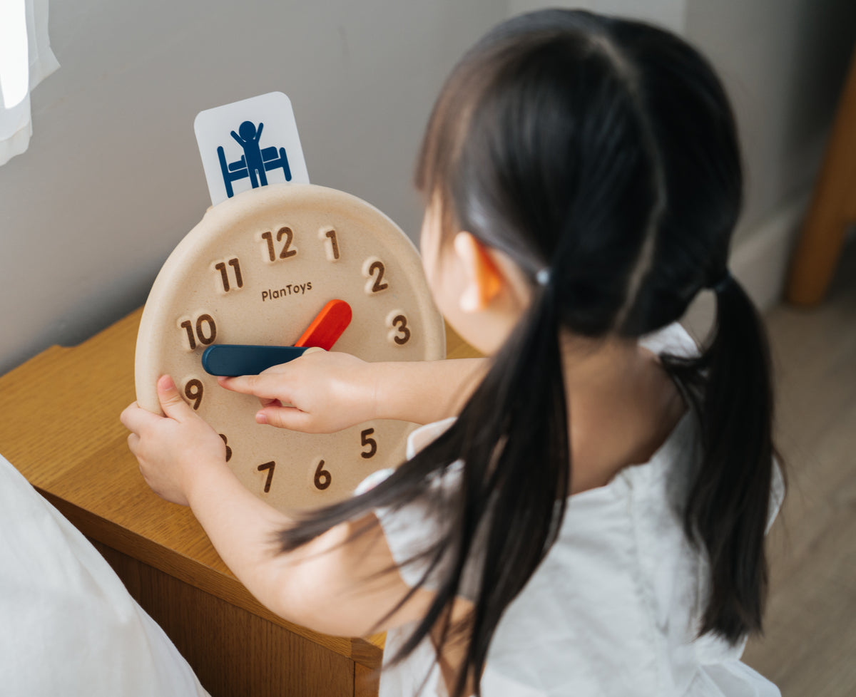 Horloge éducative en bois PlanToys