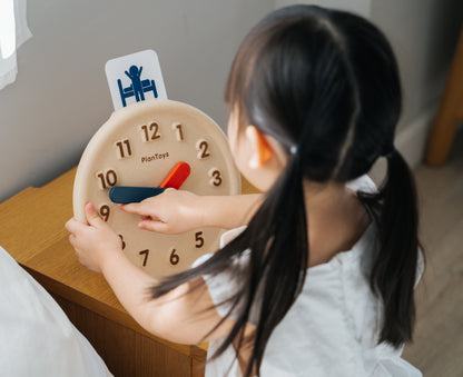 Horloge éducative en bois PlanToys