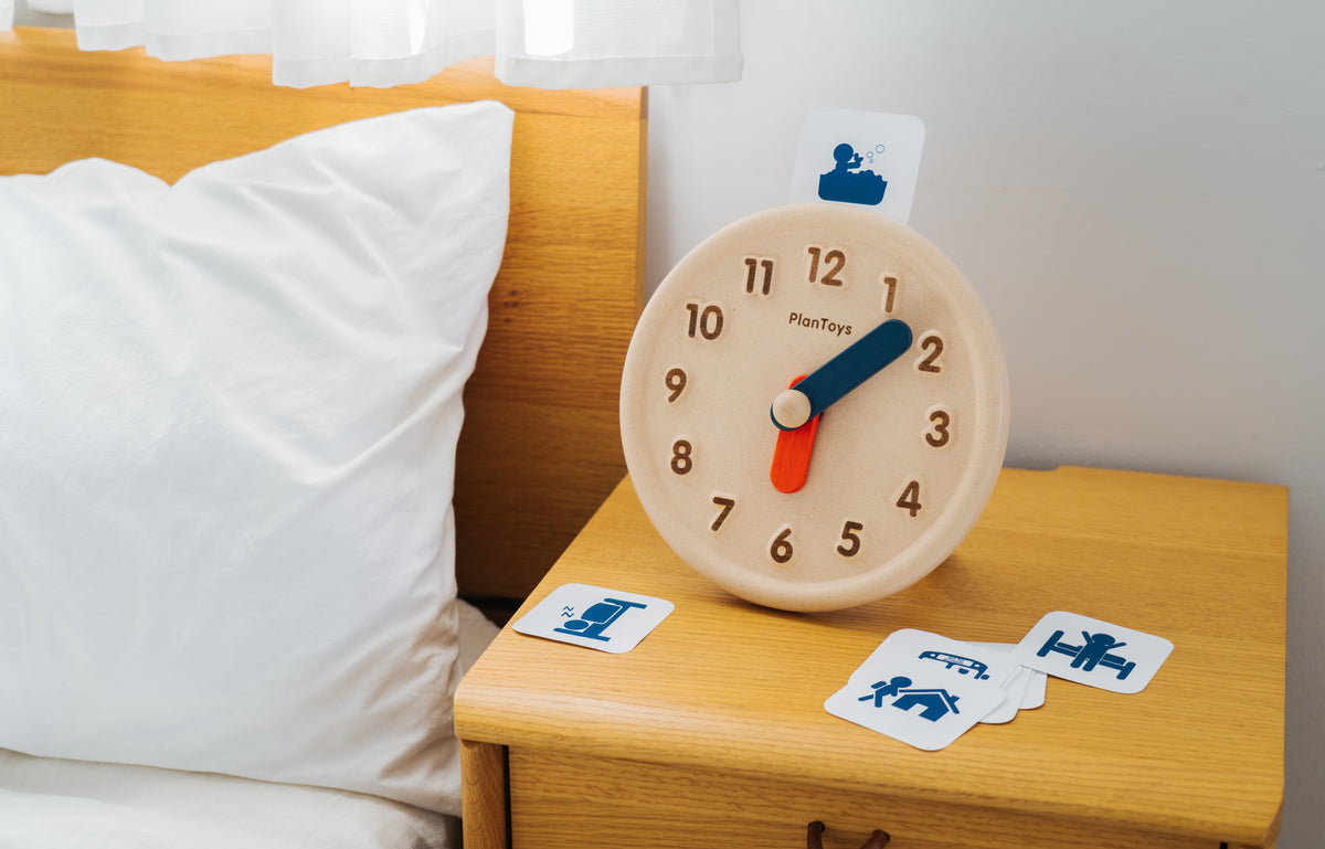 Horloge éducative en bois PlanToys
